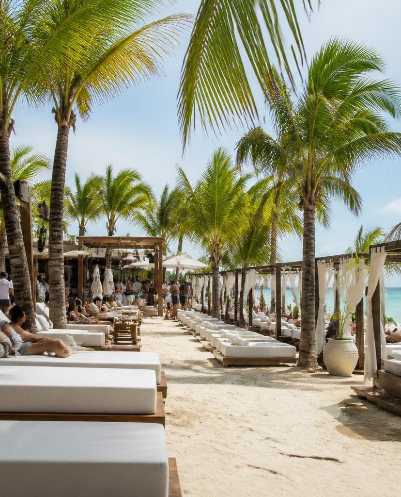 Cancun Beach Clubs: Daybeds, Day Parties & How They Work